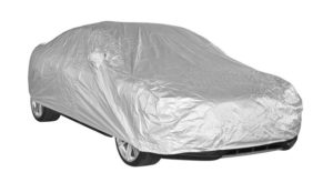 a car covered by a white car cover