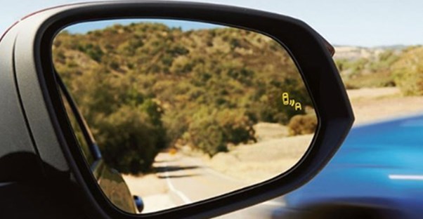 a car sideview mirror with blind spot monitoring
