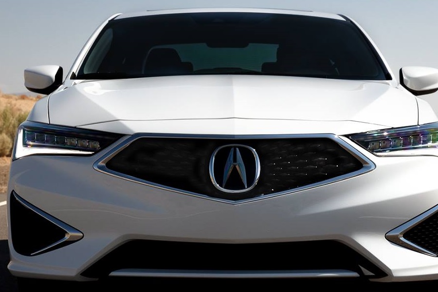 the front grille of a white 2019 acura ilx