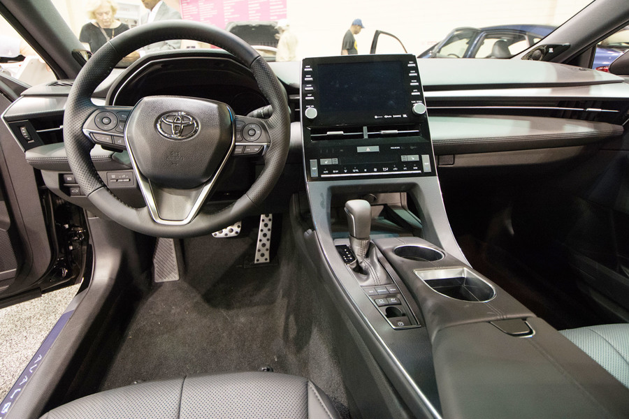 the interior dash and console of a 2019 toyota avalon
