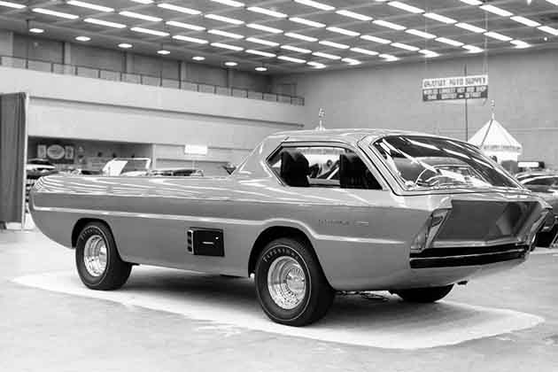 a 1967 dodge deora at an auto show