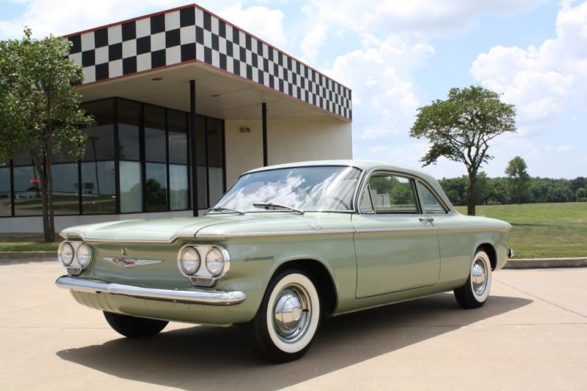 a light pale green chevrolet corvair