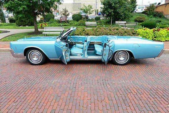 a blue lincoln continental convertible