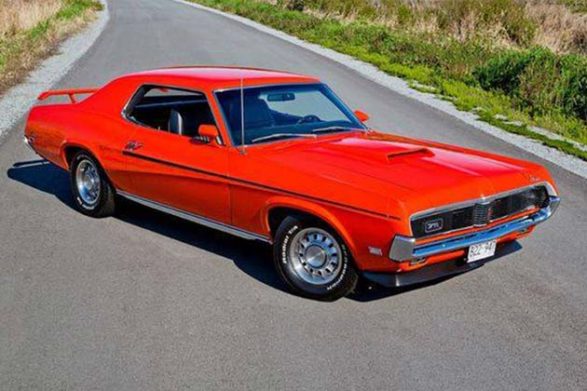 a red mercury cougar