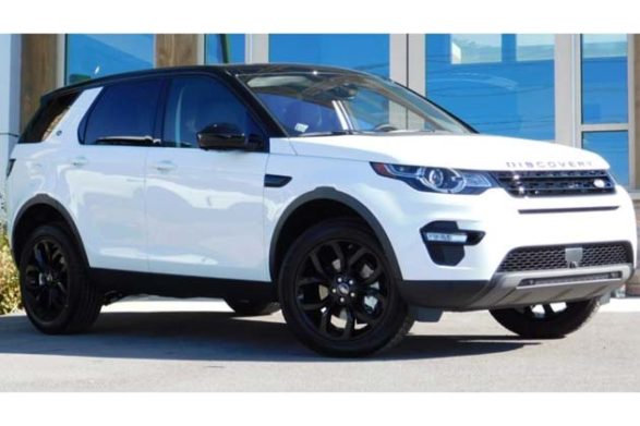 a white land rover discovery sport