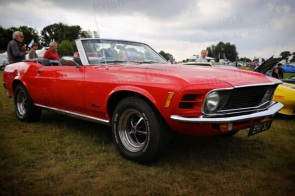 a red ford mustang mach 1