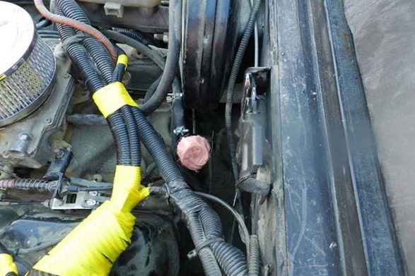 gum covering a hose inside a car