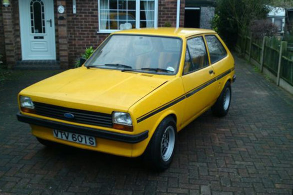 a yellow 1978 ford fiesta