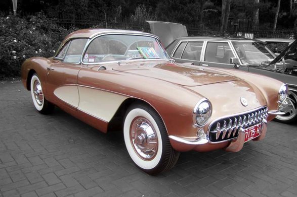 a brown and white 1957 chevrolet corvette c1