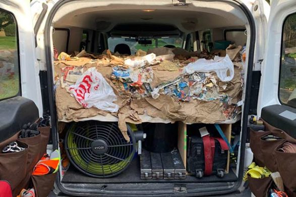 a van with fake trash in the back to hide the expensive tools underneath