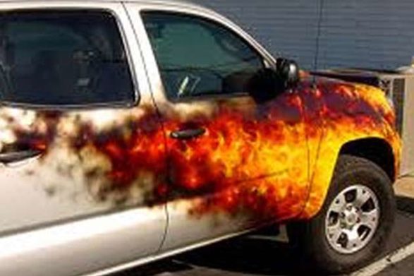a car with flames as the paint job