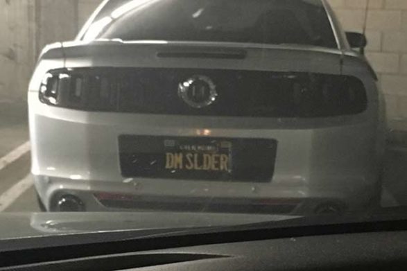 a license plate that says DM SLIDER