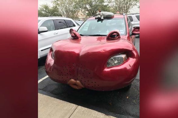 a red vehicle designed to look like a hippopotamus