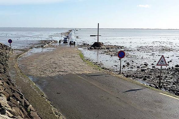 low tide at the le passage du gois in france