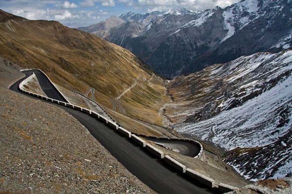 the stelvio pass in italy winds up the mountain side