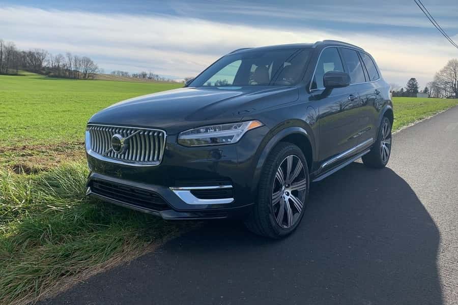 a black 2021 volvo xc90 pulled off on the side of the road