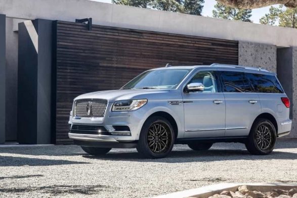 a 2019 lincoln navigator parked in a driveway