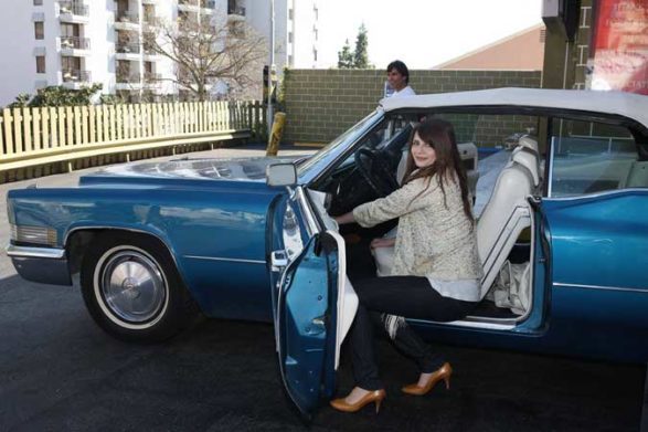 mischa barton getting out of her vintage car