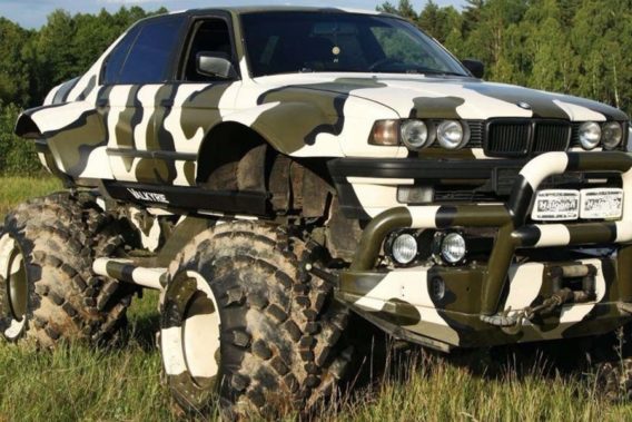 a lifted car with a black and white camo pattern