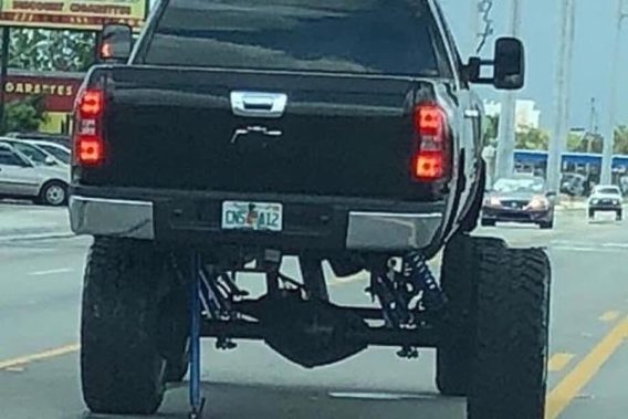 a lifted truck where the body isn't centered over the wheels but over the left two instead