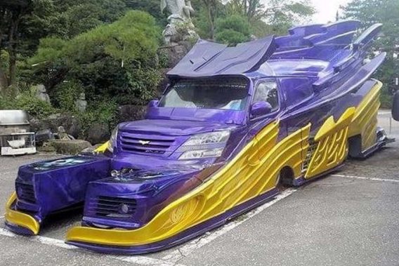 a purple and yellow van that looks almost like a dragon