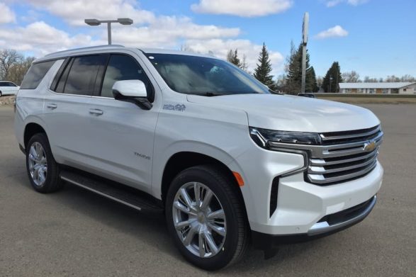 a 2021 white chevrolet tahoe on a dealership lot