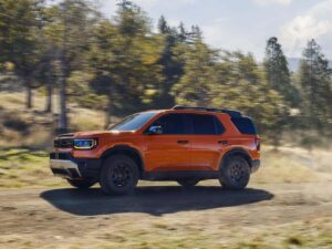 an orange 2026 redesigned honda passport
