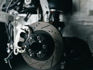 the brake pads of a car in the shop