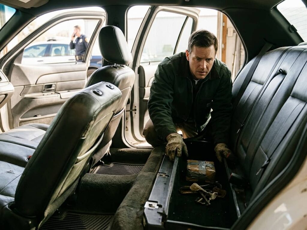 a man looking in his surplus crown victoria
